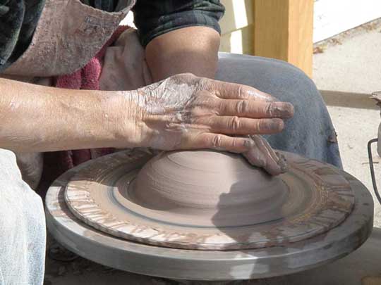 A pottery demo outside Cazenovia Artisans