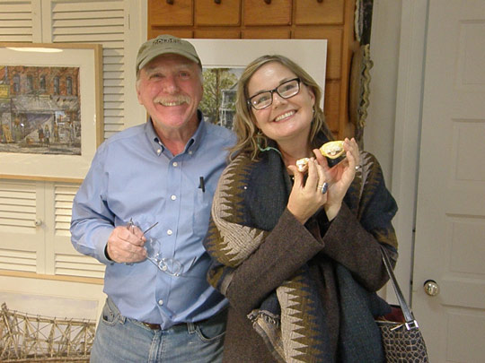 A happy Art Trail customer with the artist, Roger Demuth