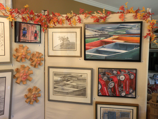Display of Rick Marchant paintings and ceramic pieces