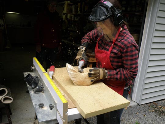 Shawn Halperin demonstrating one of her wood carving techniques