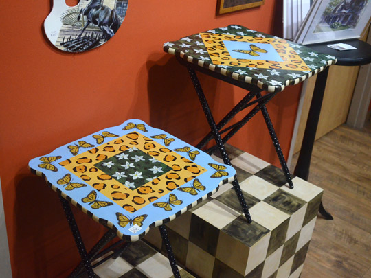 Monarch butterflies featured on painted tables by Marilyn Fegan