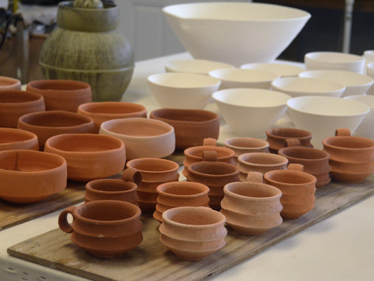 A collection of ceramic items awaiting glazes at the Liz Lurie/Peter Beasecker studio
