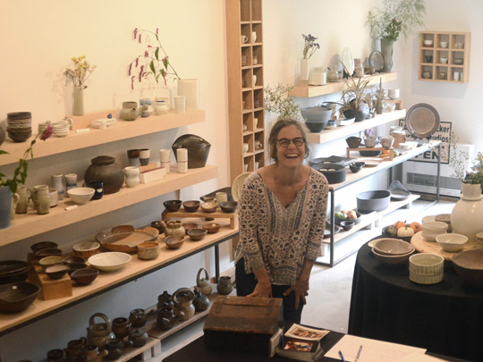 Liz Lurie at her (and Peter Beasecker's) gallery filled with ceramic treasures