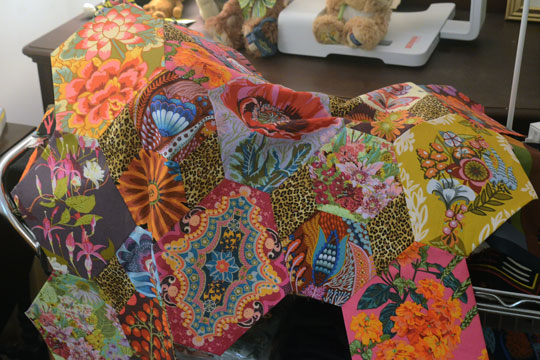 A vibrant, quilted creation by Susan Poet