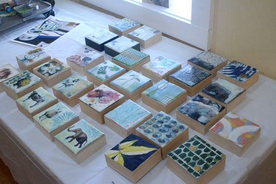 A table full of Sally Hoonick's elegant encaustic blocks