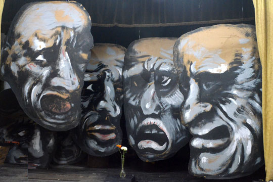 Huge, dramatic faces by Geoffrey Navias greeted Art Trail hikers at stop #18.