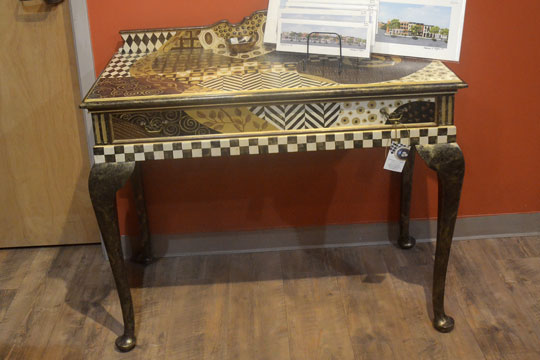 Marilyn Fegan's painted furniture is also shown at Cazenovia Artisans.